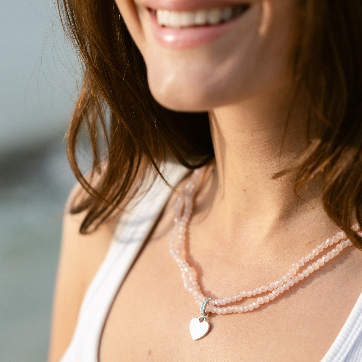 Perlenhalskette Rosa Elastisch mit Herz-Charm Gold | Wasserfest