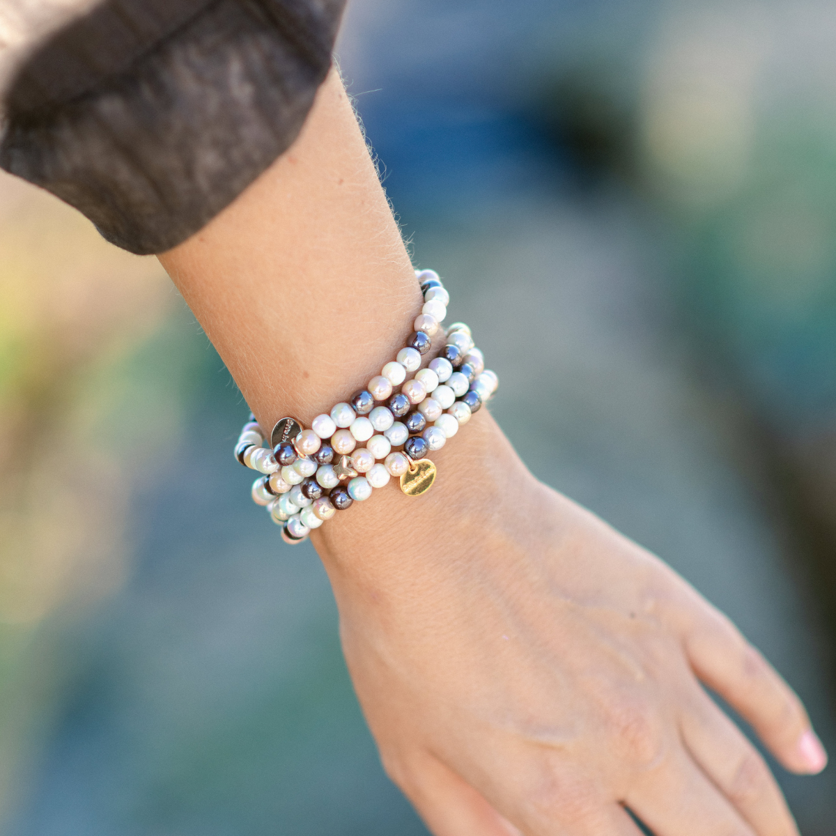 Perlenarmband Multi Braun mit Schmetterling – 3D Intensiv Glow 6mm
