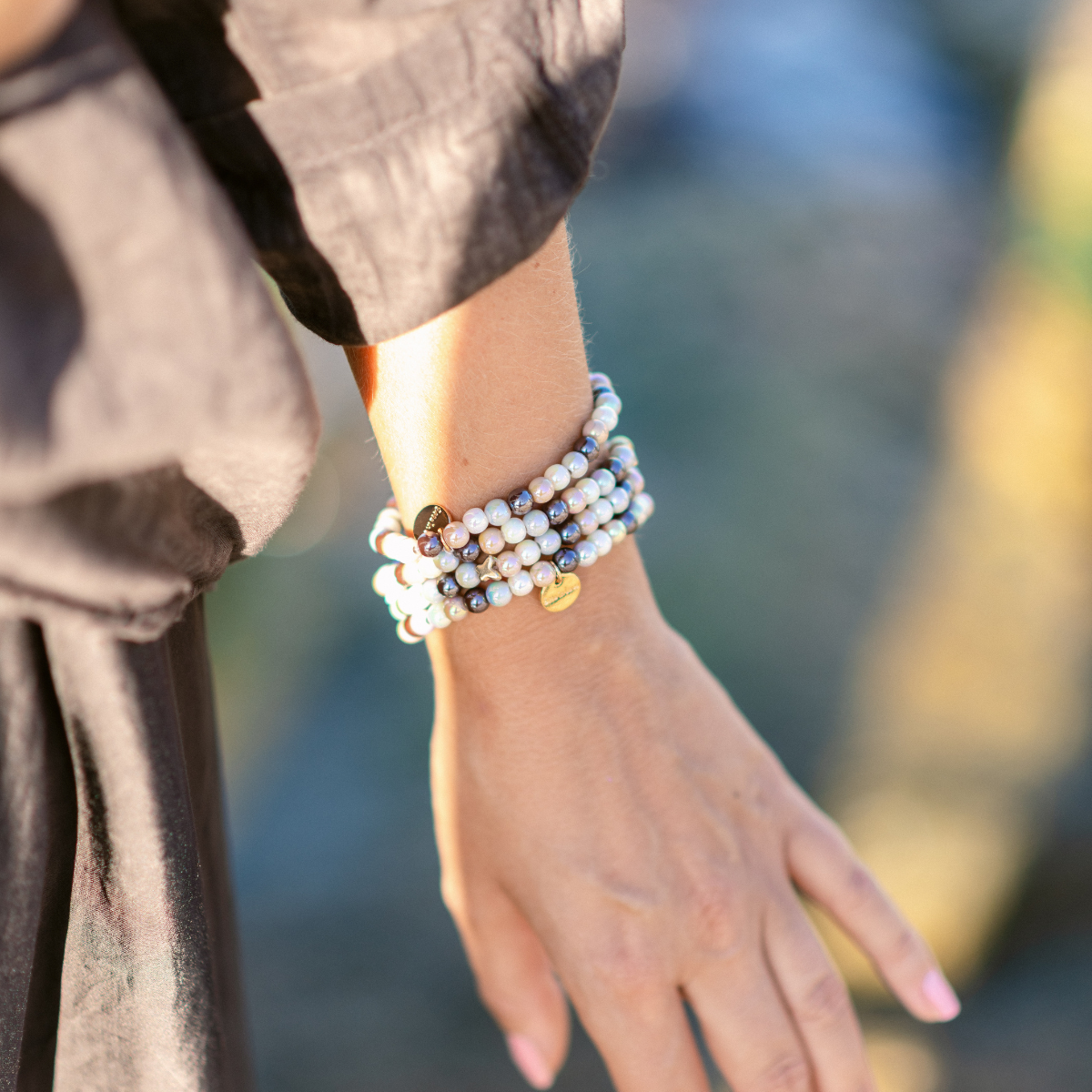 Perlenarmband Multi Braun mit Schmetterling – 3D Intensiv Glow 6mm